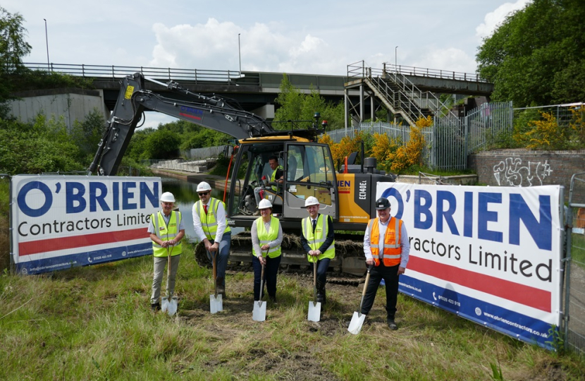 Lee and others at the ground breaking ceremony for the canal